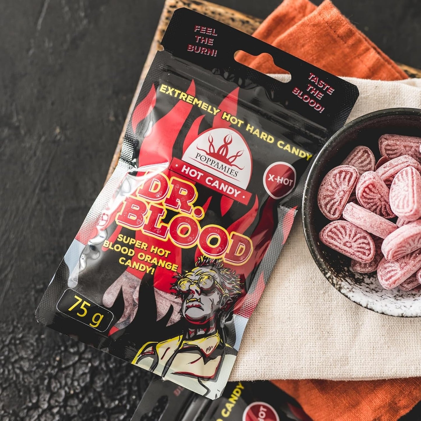 Poppamies Bonbons Épicés Dr Blood Chili Orange - Sans Lactose Sans Gluten Végan - Pas pour les enfants ni pour les farces d'Halloween - Piquant : X-HOT - Taille : 75g
